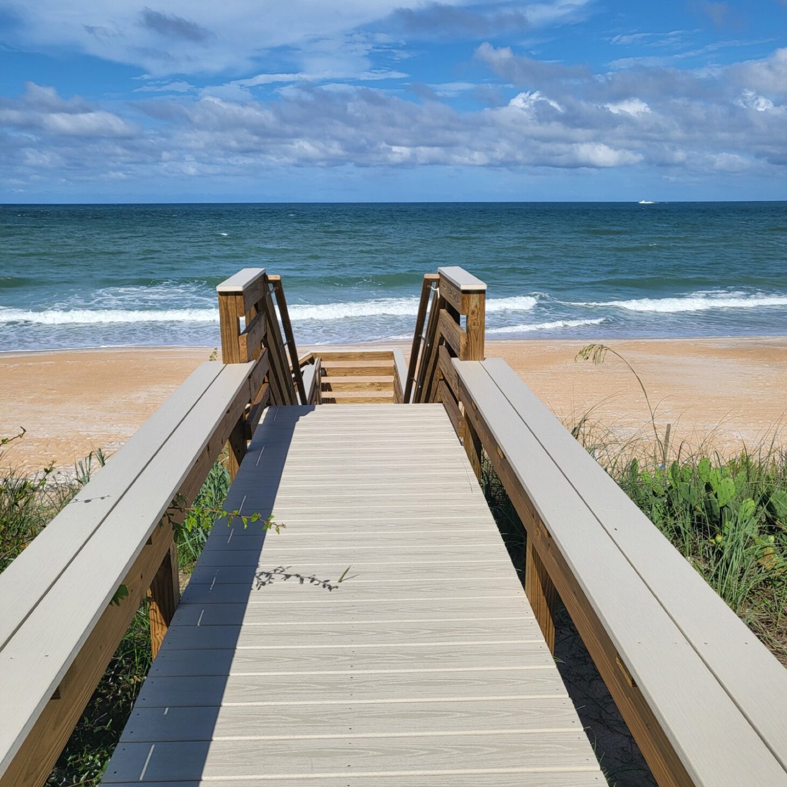 Walkway toward the beach at Salty Dog Lodge