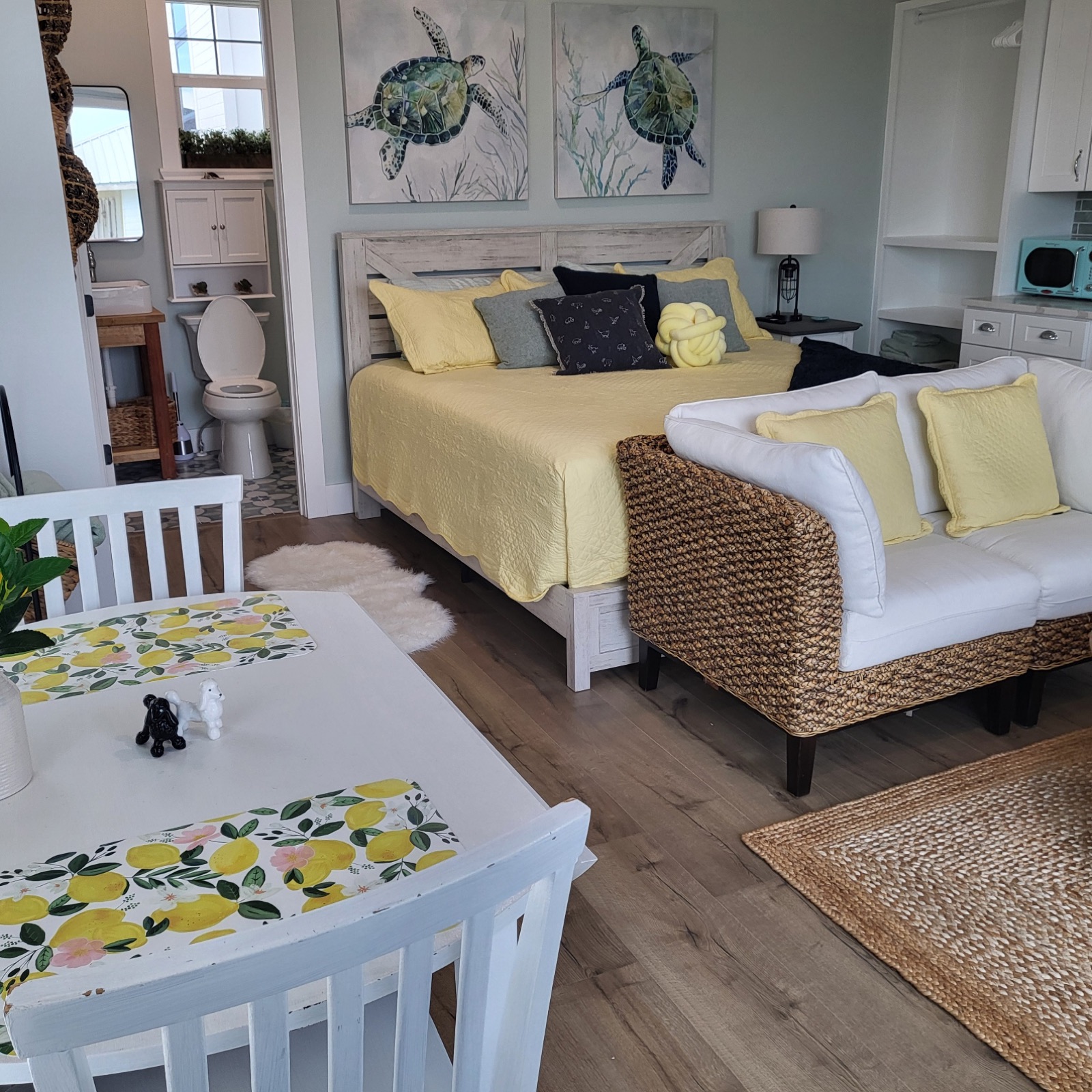 King bed and sunny coastal interior in Unit 2